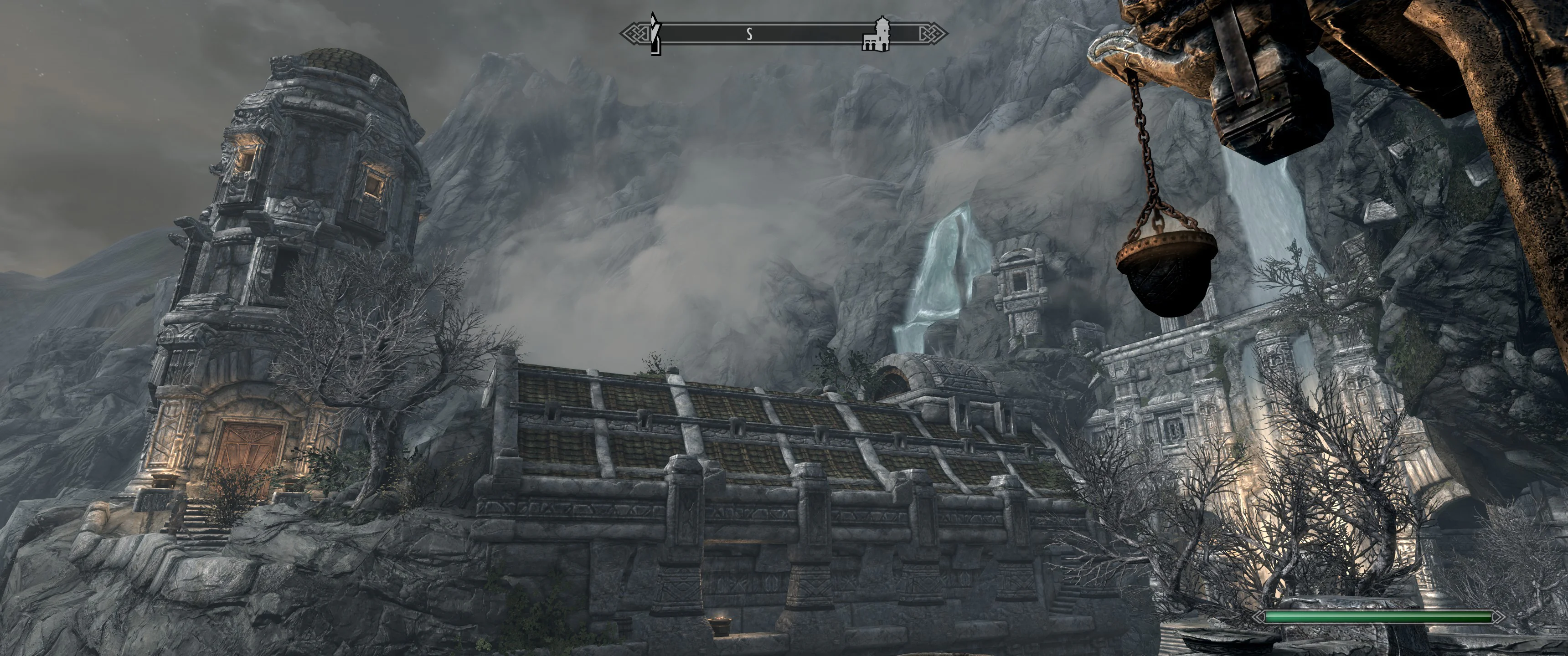 Volumetric fog and clouds make the mountains feel harsh and imposing.