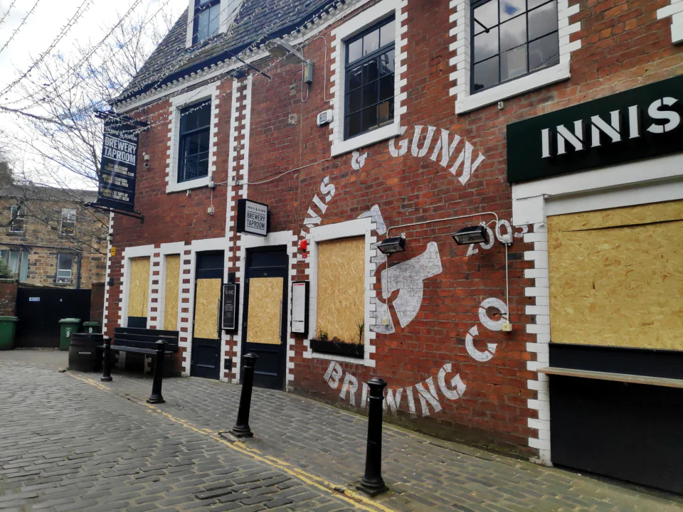 Another boarded up bar.