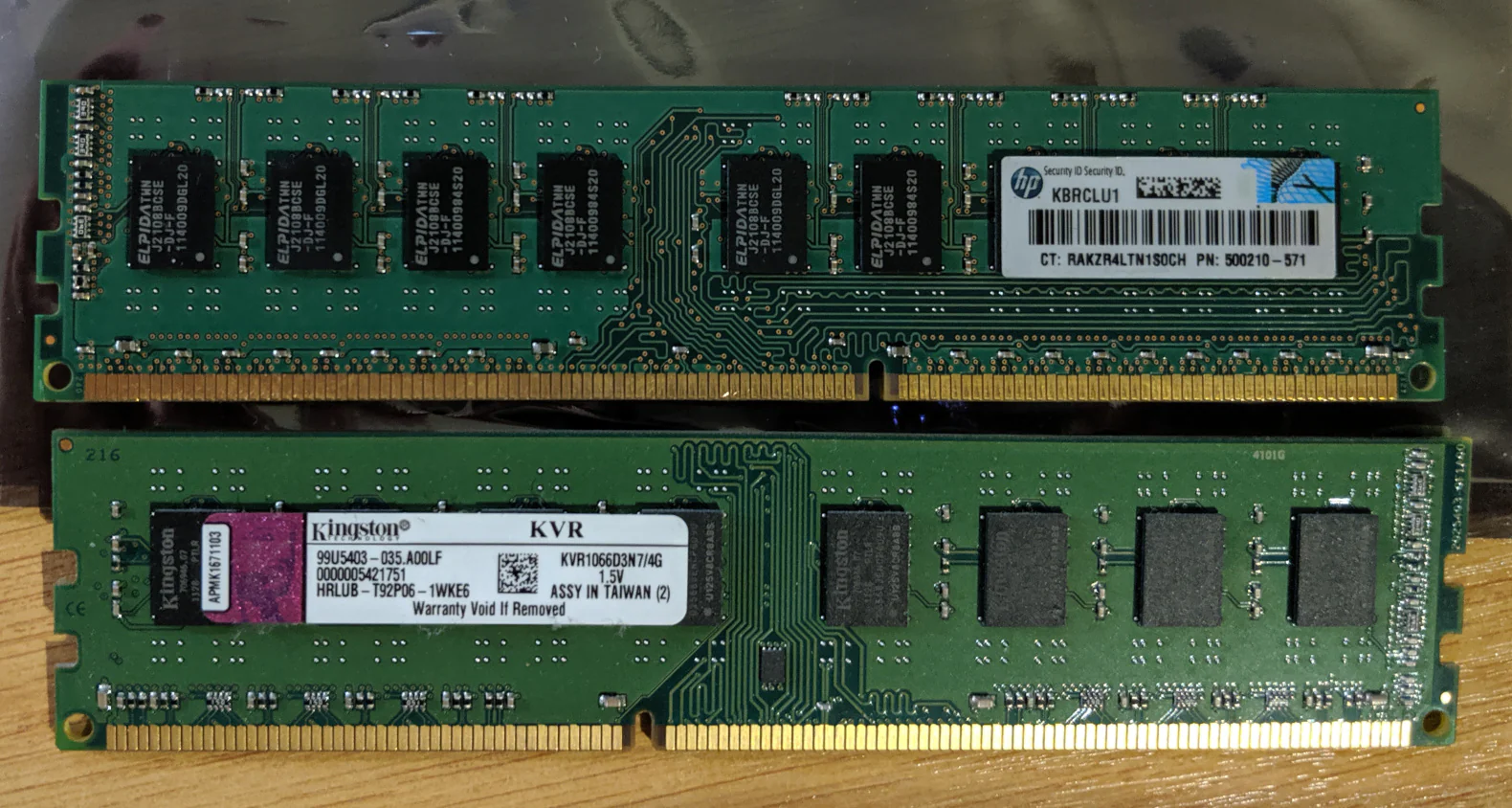 The EEC memory compared to the non-ECC memory I originally had installed. The number of chips is the dead giveaway for ECC memory as there's a 9th chip to hold the parity bits.